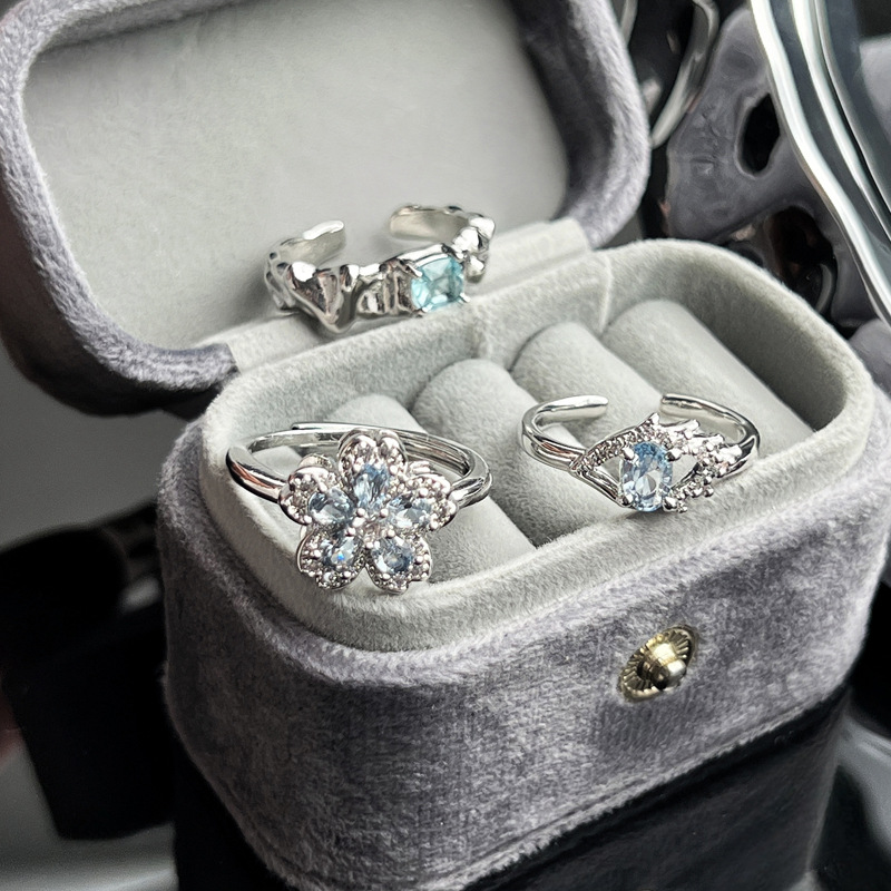 Korean version exquisite ice blue full diamond flower fashion ring, a cold and elegant female style, light luxury and high-end, sweet and cool stacked food ring Specification drawing