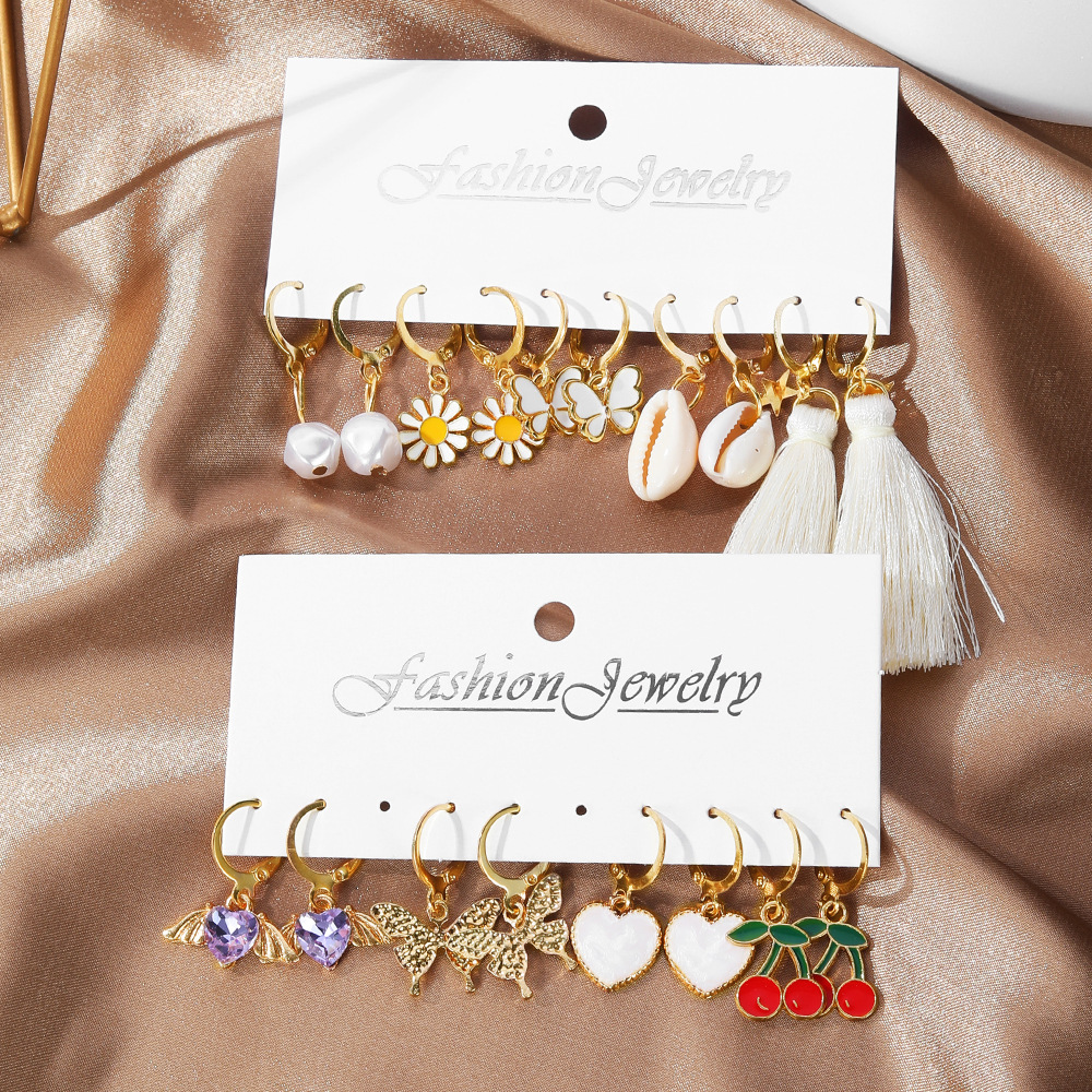 Wholesale of European and American cross-border accessories, fashionable tassel shell earrings, versatile for women's charm, diamond-encrusted cherry small butterfly stud earrings Application Scenario