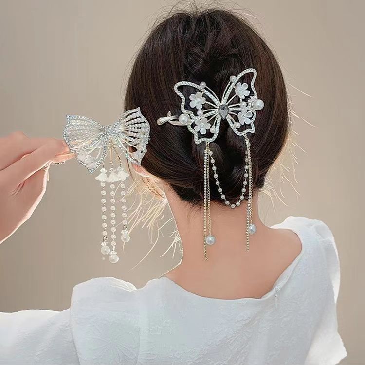 New high-end lily of the valley tassel hair clip, women's light luxury style, twist clip, back of the head spring clip hair clip details Picture