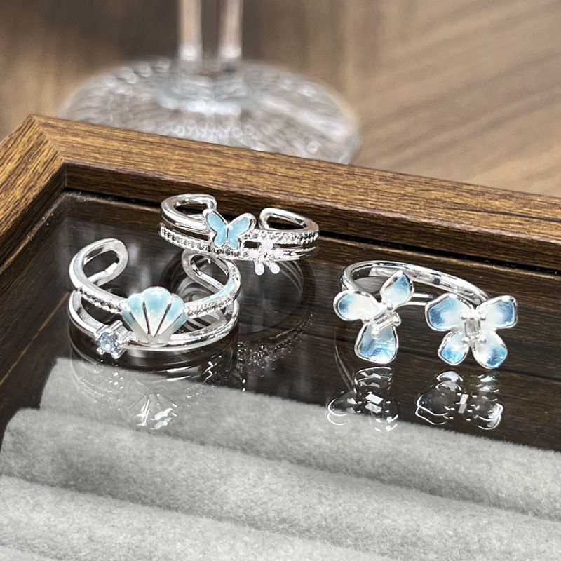 Blue butterfly flower language layered cream style gradient blue dynamic flower butterfly ring for women's fashionable cold style index finger ring Application Scenario