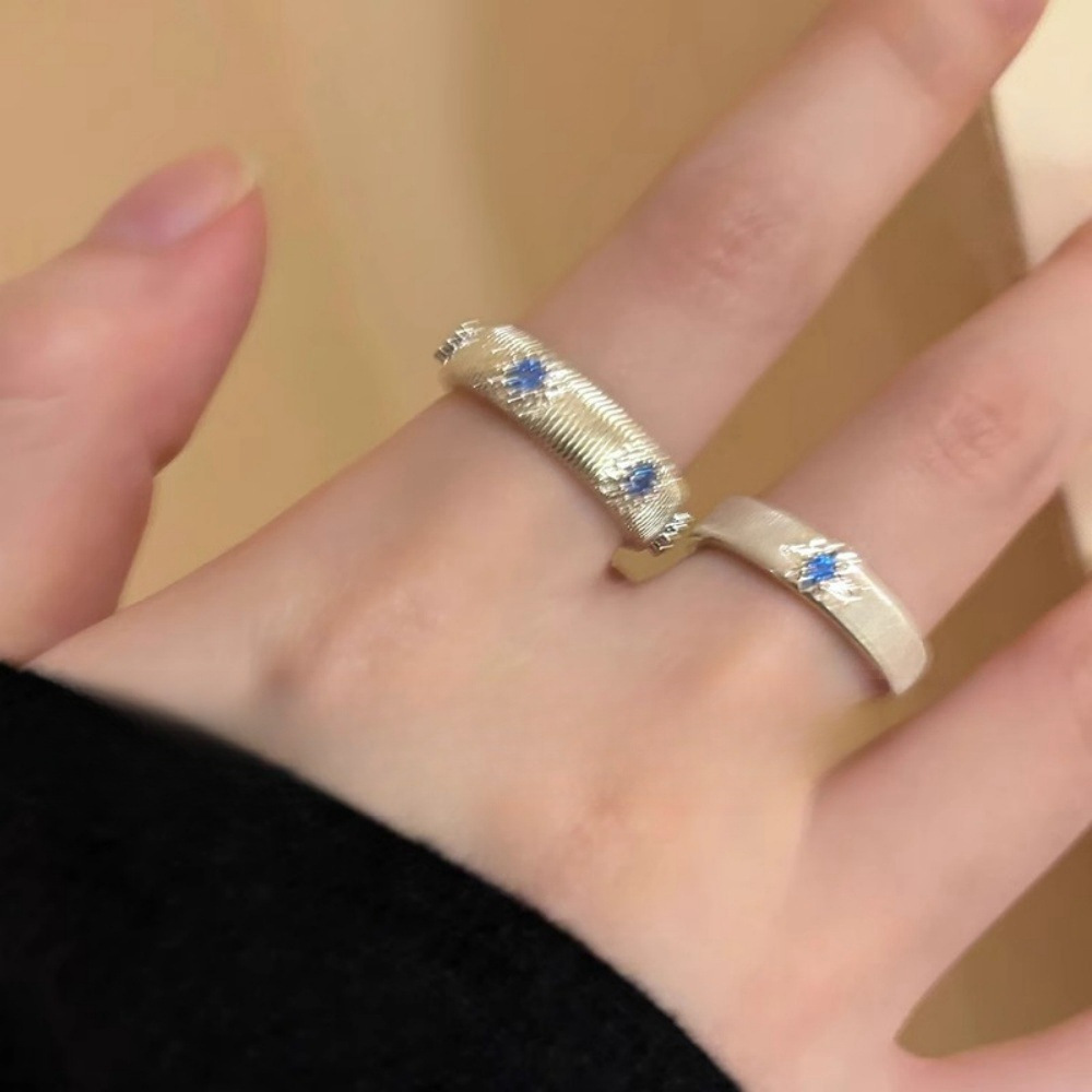 A sea blue zircon cross brushed ring, a niche design for women, is a couple's index finger ring with a light luxury and high-end feel Specification drawing