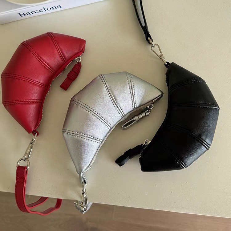 Mini neck-hanging small change key bag with a unique design sense and a stylish crossbody lipstick headphone bag. Cute horn bag details Picture
