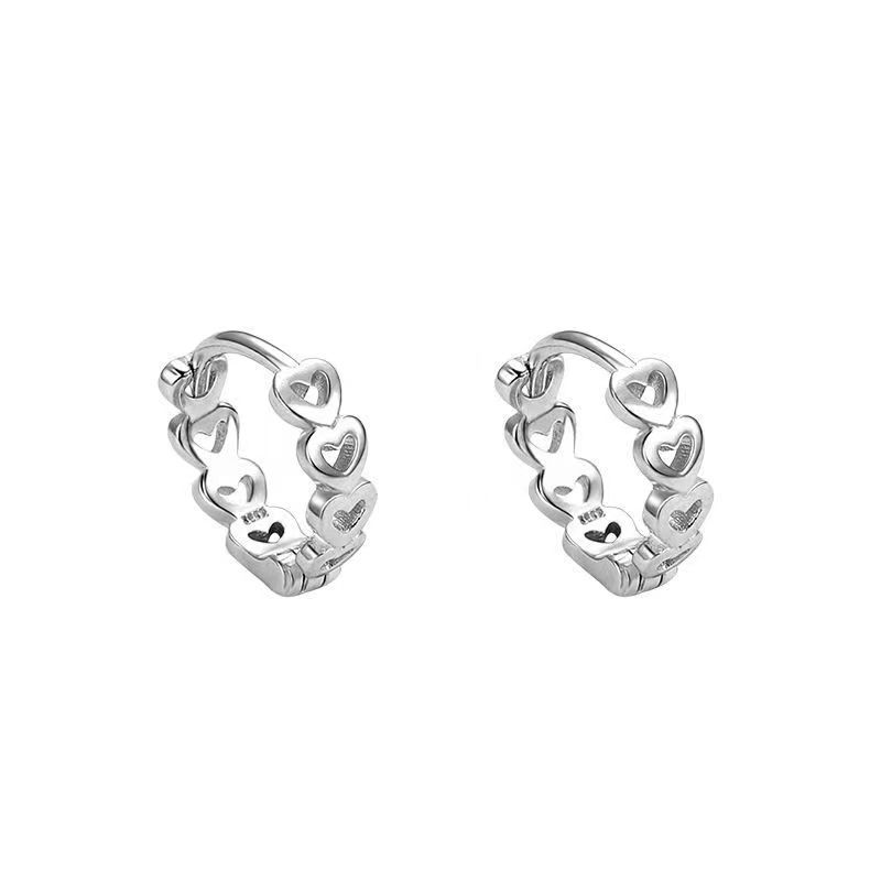 The simple and hollowed-out heart-shaped ear studs are fashionable and versatile for women, with a sweet and unique personality. The new style of ear studs in 2025 features a trendy and niche design Item Picture