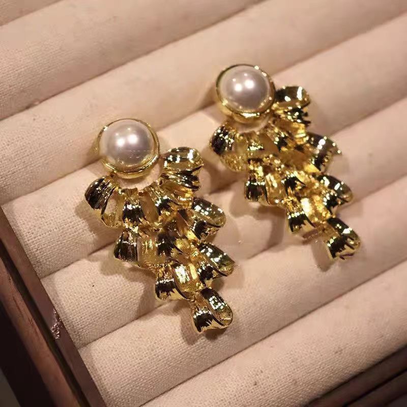 vintage style imitation pearl hollowed-out gold earrings, retro exaggerated palace stud earrings, unique earrings for women Application Scenario