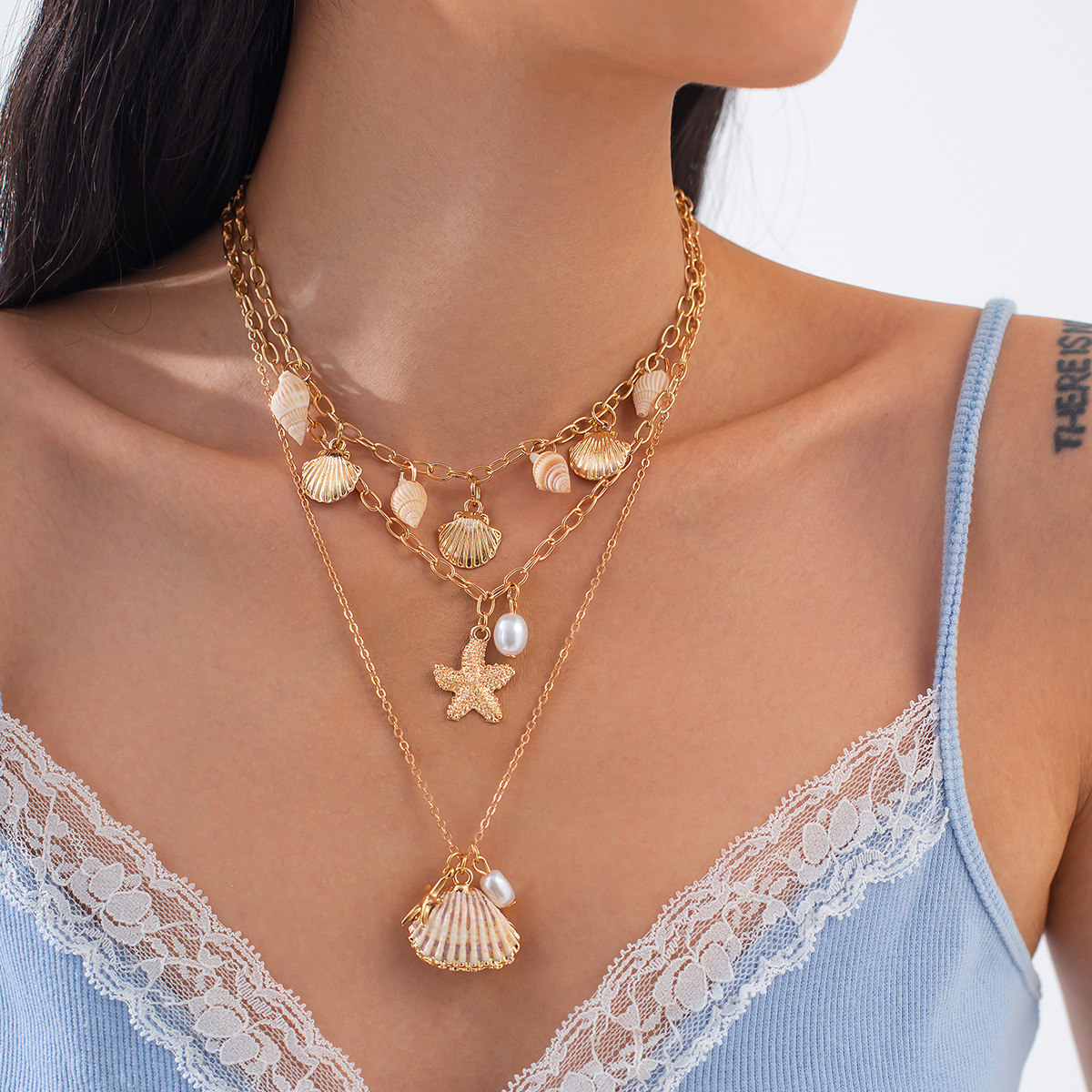 European and American cross-border jewelry, Bohemian shell starfish pendant necklace, vacation multi-layer alloy pearl collarbone chain details Picture