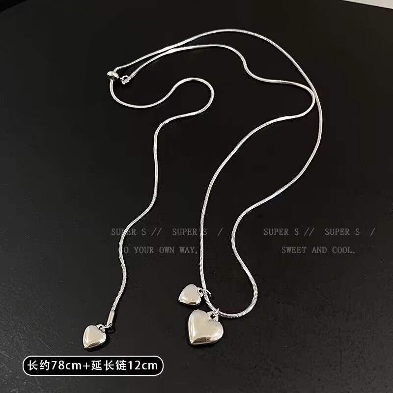 Heart-shaped pendant necklace for women, 2024 new long sweater chain, light luxury, niche design, versatile collarbone chain details Picture