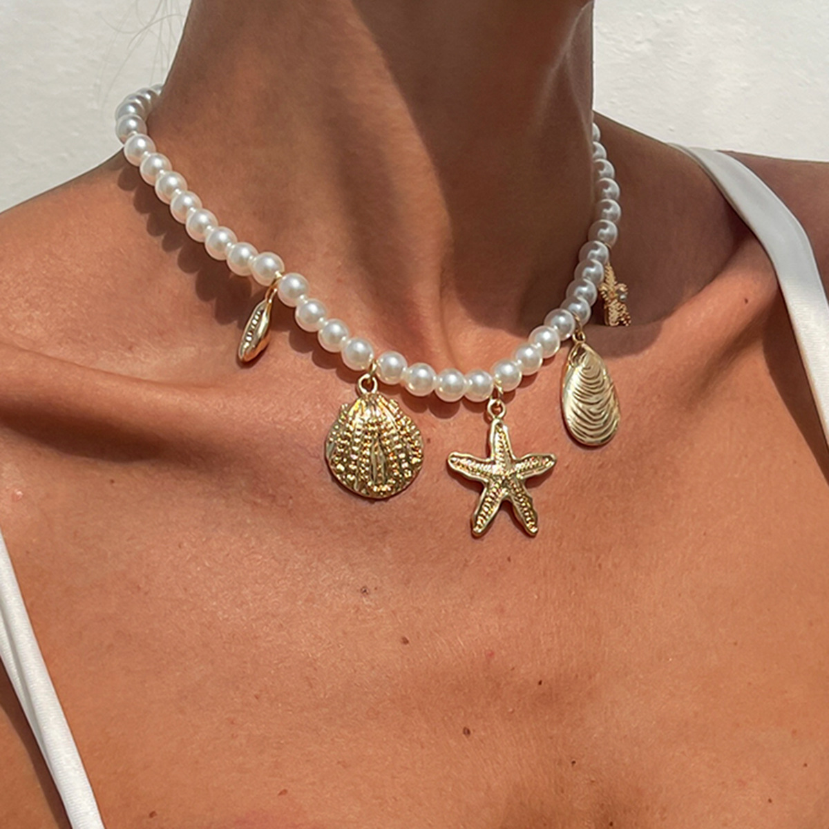 European and American cross-border jewelry design sense metal starfish pearl necklace isn wind scallop alloy necklace necklace Specification drawing