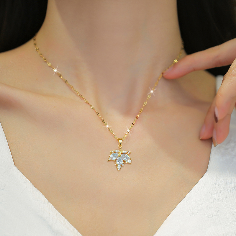 【 Titanium Steel 】 Micro-inlay necklace and earring set, light luxury Maple leaf Full diamond, personalized and elegant banquet earrings and necklaces combination details Picture