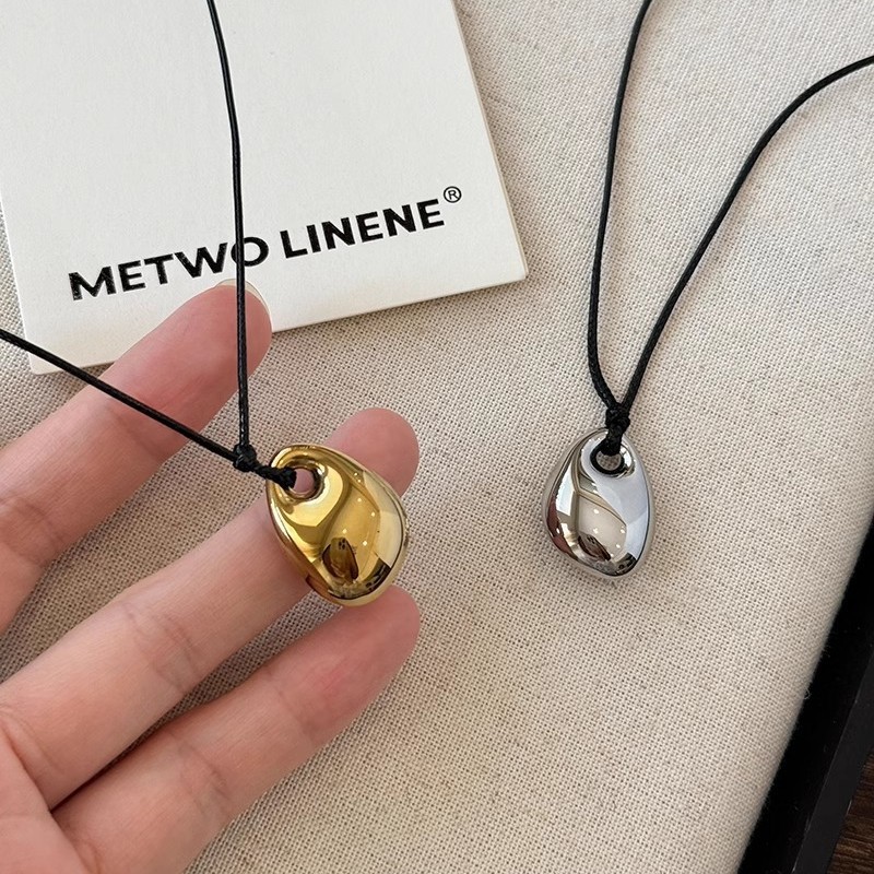 The blogger's same style golden bean black leather rope necklace, a unique, simple and sweet cool sweater chain new accessory for women details Picture