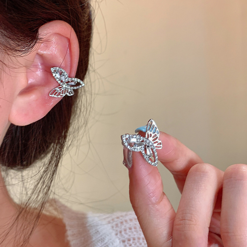Super ethereal and elegant hollowed-out diamond-encrusted butterfly ear bone clip earrings, versatile for women, high-end and elegant stud earrings wholesale full figure