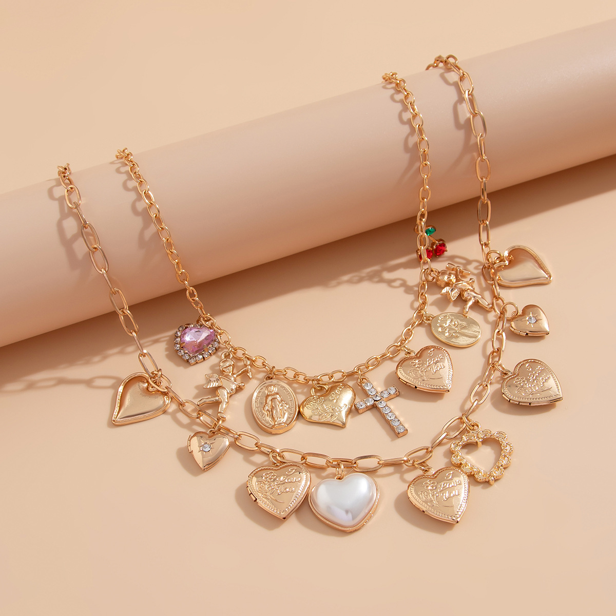 European and American cross-border jewelry, ins heart-shaped element pendant, alloy necklace, layered style, diamond-encrusted cross collarbone chain Application Scenario