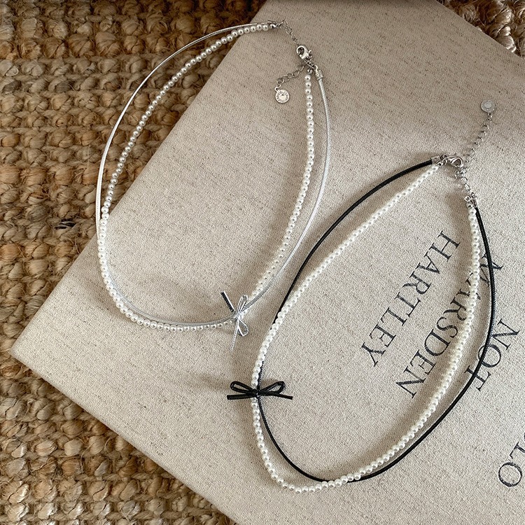 Double-layer leather bow pearl necklace with a girlish charm, sweet and cute, elegant and versatile, unique neckchain and collarbone chain details Picture