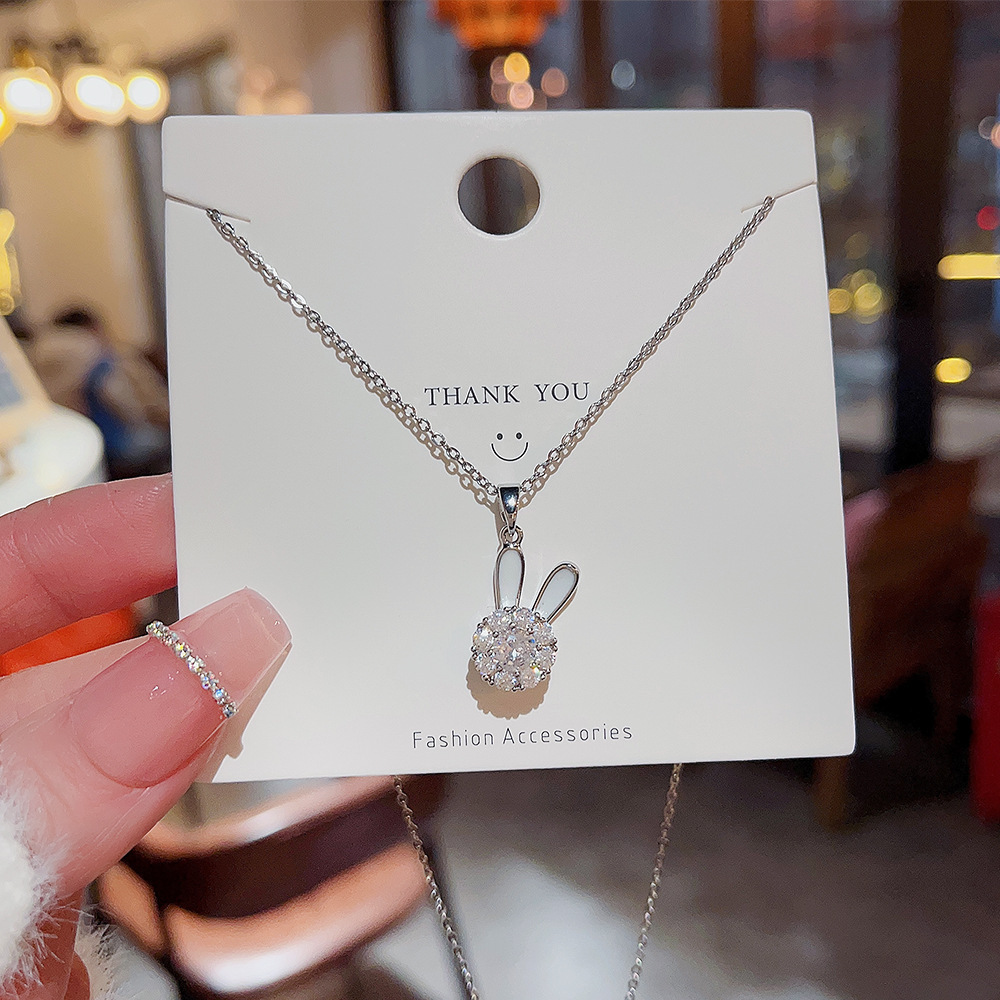 A Japanese and Korean design style rotating rabbit necklace pendant, a niche collarbone chain, a high-end and light luxury neckchain, titanium steel jewelry for women Application Scenario