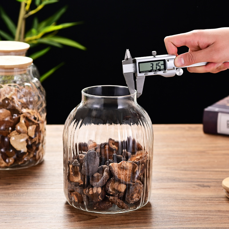 Wholesale tangerine peel storage jars, household large-diameter round transparent glass storage jars, thickened five-grain and miscellaneous grain storage jars details Picture