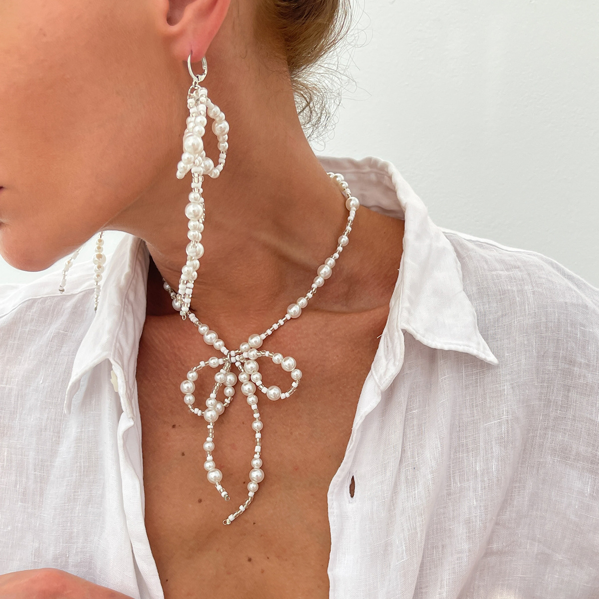 European and American cross-border jewelry, personalized large and small pearl earrings, simple rice bead bow earrings, necklace set Specification drawing