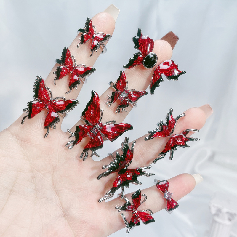 A sweet and cool red enamel drop glaze butterfly opening ring with a feminine charm, a unique and exquisite design, and a distinctive personality full figure