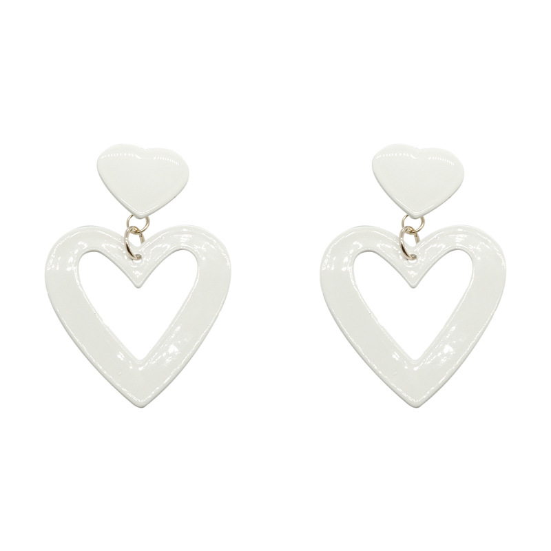 Exaggerated white heart-shaped earrings for women, a new trendy earpiece from 2025, a social media sensation on Instagram, with a cold and unique European and American style Item Picture