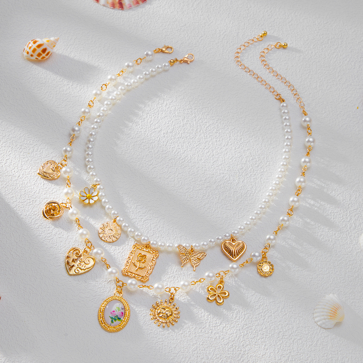 European and American cross-border jewelry, vacation style butterfly sunflower alloy necklace, sexy hot girl pearl beaded collarbone chain Application Scenario