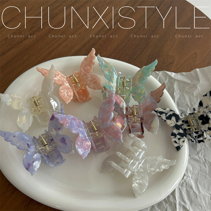 A super ethereal and colorful three-dimensional butterfly hair clip, a sweet and cute girl acetic acid hair clip for half-tying hair at the back of the head, a new Korean-style hair clip Application Scenario