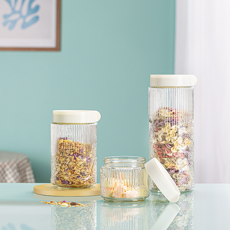 A five-piece set of transparent and sealed glass food storage containers for circular compartments of kitchen grains and cereals details Picture