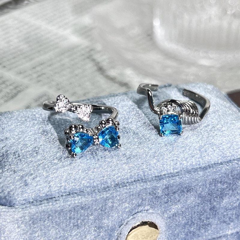 Fashionable and individual sea blue heart-shaped zircon bow open ring, a unique and niche geometric ring for women with a light luxury touch Application Scenario