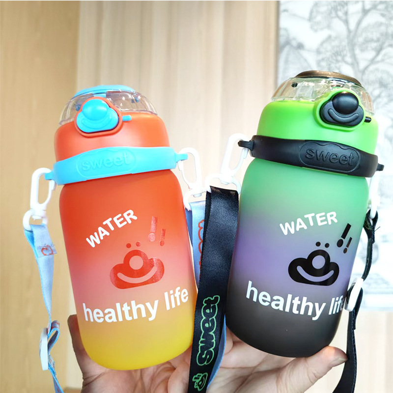 Summer new cartoon 600ml colorful matte bouncing lid PC student plastic cup for boys and girls with strap portable water cup details Picture