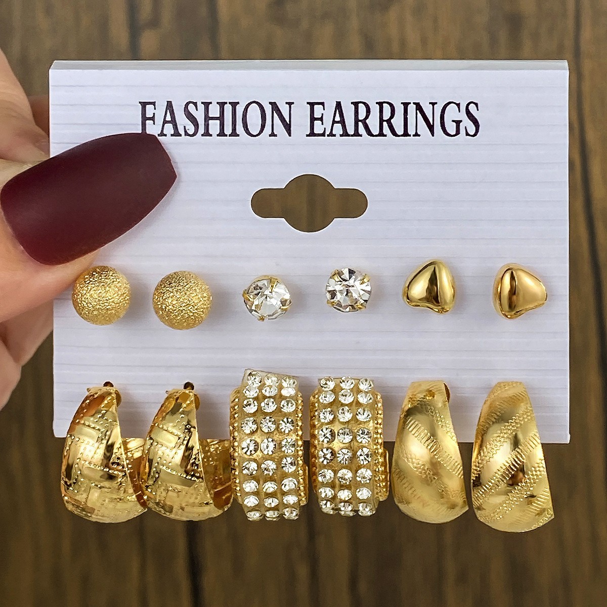A set of 6-piece cross-border artistic retro geometric hammered pattern earrings from Europe and America, creative heart-shaped diamond-encrusted metal earrings full figure