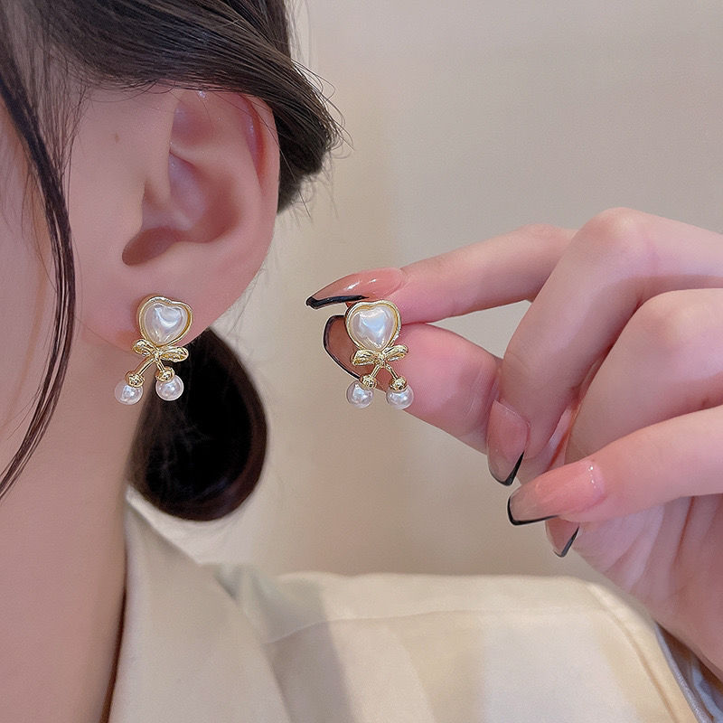 Autumn and winter bow heart-shaped cat's eye stone earrings for women, 2025 new trendy and fashionable earrings, high-end and light luxury stud earrings details Picture