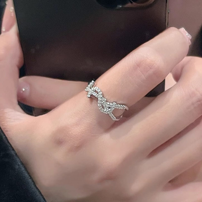 Sweet and cool letter zircon ring, a light luxury and niche design for women, a high-end index finger ring, fashionable and individual opening ring trend Application Scenario