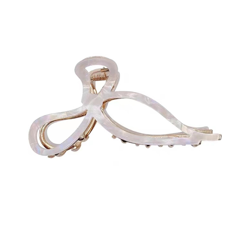 New design sense acetic acid hollowed-out bow hair clipper at the back of the female head, high-end shark clip headwear, hairpin clipper Item Picture