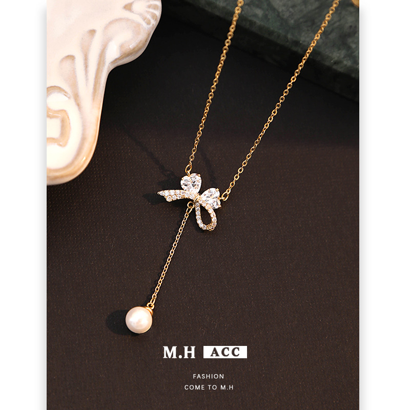 A light luxury bow zircon pearl necklace with a high-end female feel, a new Korean-style golden collarbone chain, a fashionable commuting accessory Specification drawing