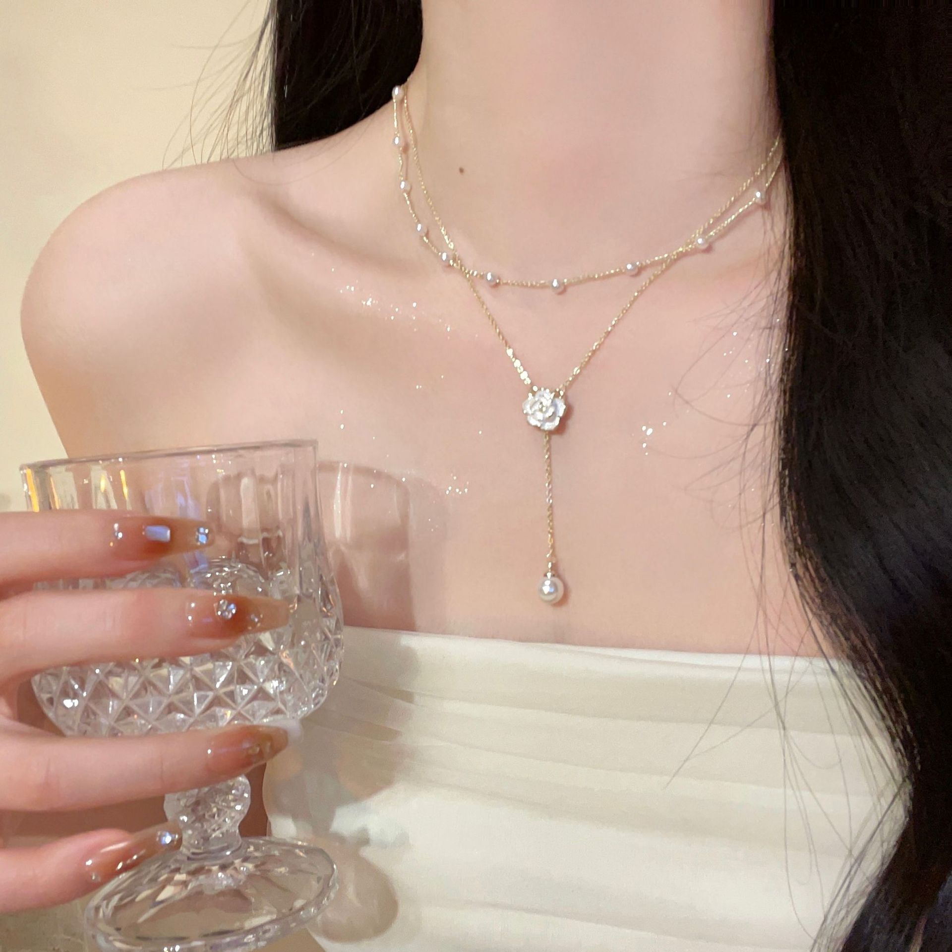 Double-layer tassel pearl necklace with a unique design sense for women. Camellia collarbone, light luxury style, beaded around the neck Application Scenario