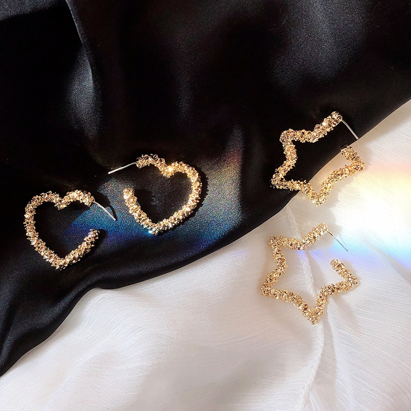 s925 Metal hollowed-out heart-shaped star five-pointed star earrings, women's silver stud earrings, simple, fashionable, individual and trendy Application Scenario
