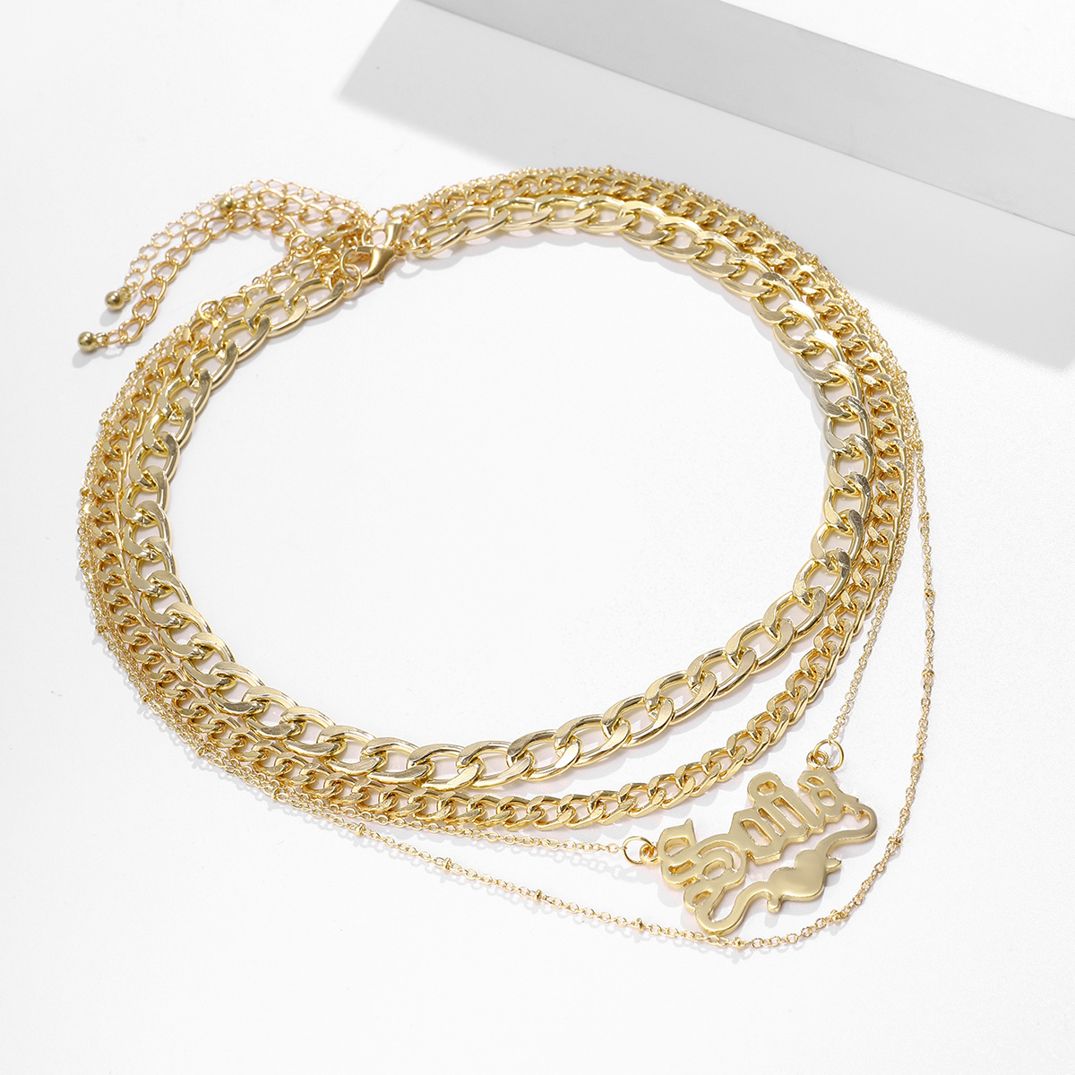 European and American cross-border jewelry: Simple tassel multi-layer hollowed-out chain necklace, geometric letter retro metal necklace details Picture