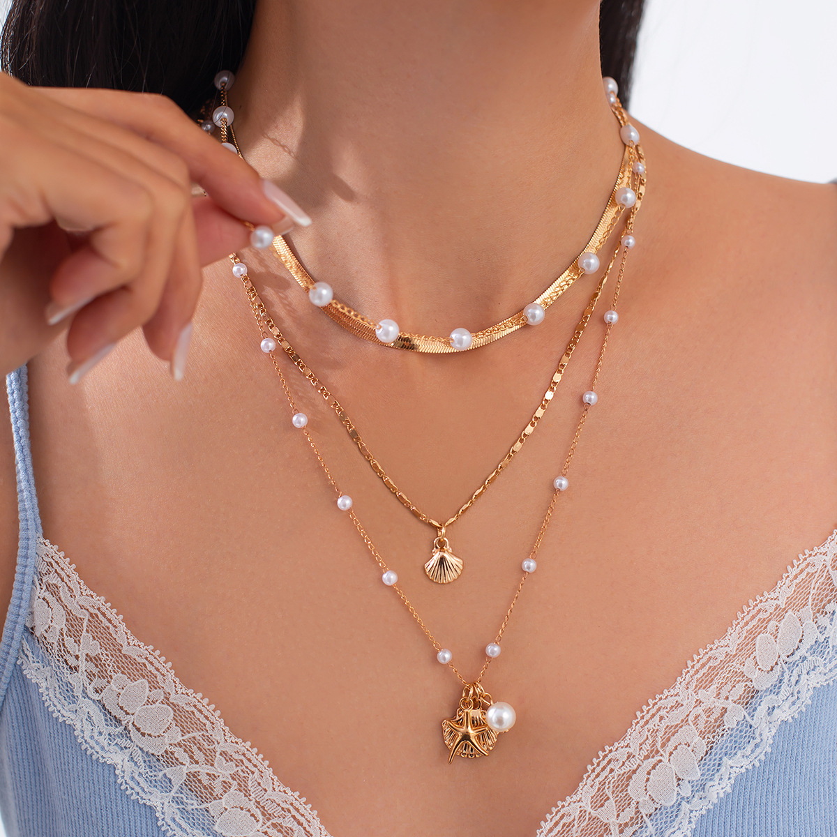 European and American cross-border jewelry ocean-style metal starfish shell necklace set, design sense pearl chain collarbone chain Specification drawing