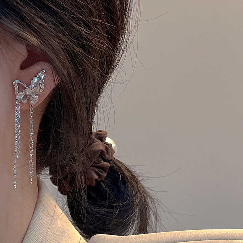 S925 Silver Needle Japanese and Korean sweet and cool butterfly tassel earrings for Women, a unique and simple cold style hot girl earrings this year Application Scenario