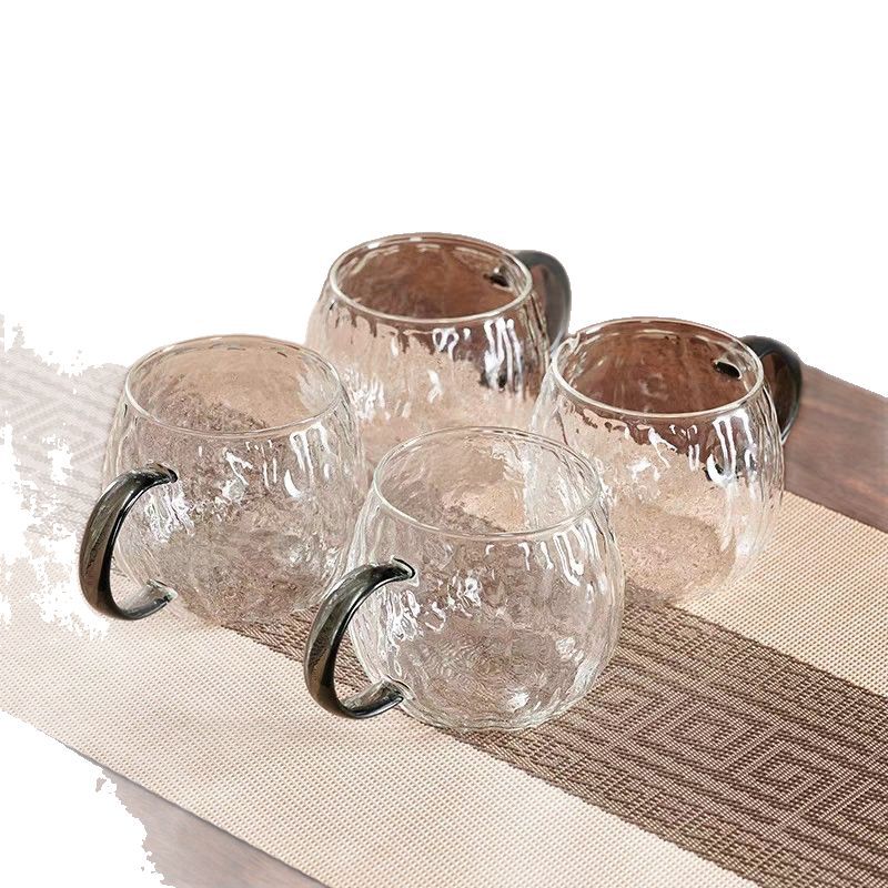 Cross-border glass cups, heat-resistant high borosilicate glass, hammer-textured beverage and drinking cups, household single cups with handles, round and fun glass Item Picture