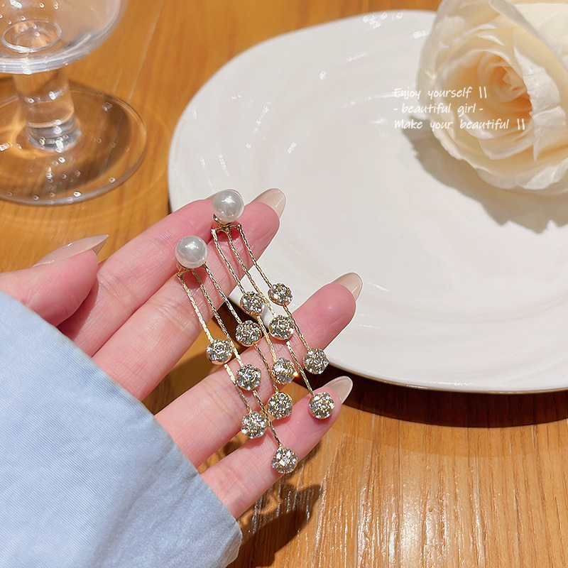 S925 Silver Needle ultra-ethereal pearl tassel earrings, women's light luxury high-end design sense, versatile and elegant earrings wholesale full figure