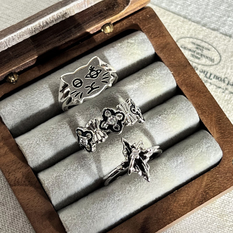A dark glazed four-leaf clover cross open ring with a unique European and American punk style, a fashionable Saturn cat ring for women full figure