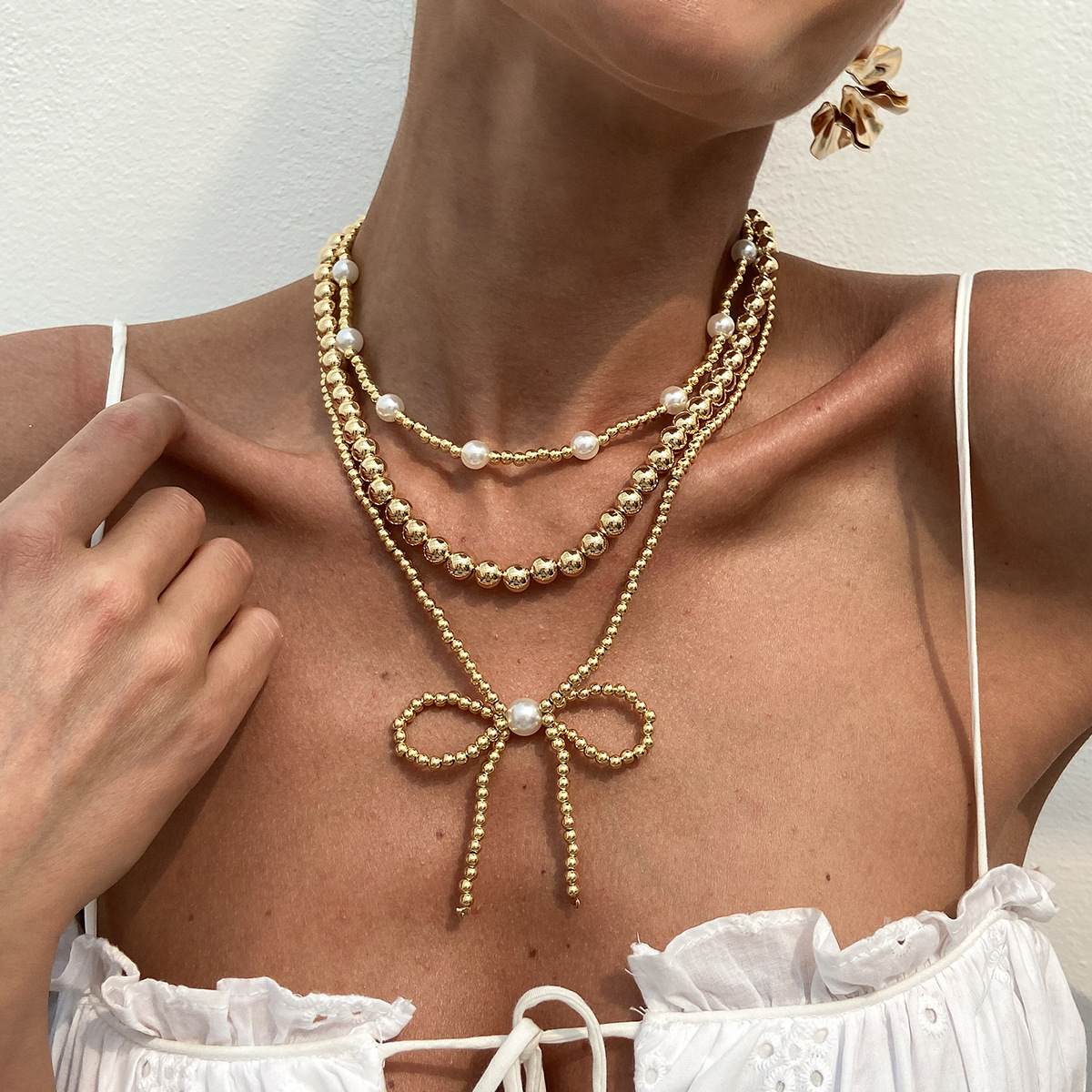 European and American cross-border jewelry, Bohemian CCB bow pendant necklace, retro imitation pearl beaded collarbone chain full figure