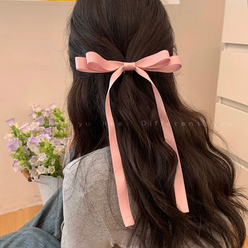 The bow ribbon hair clip, a new semi-tied hair clip and a hairpin for the back of the head, is a popular female hair accessory in the forest style full figure