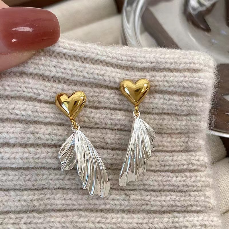 Elegant fishtail heart-shaped earrings for women, unique design sense, stud earrings, new 2025 bestsellers, personalized earrings Application Scenario