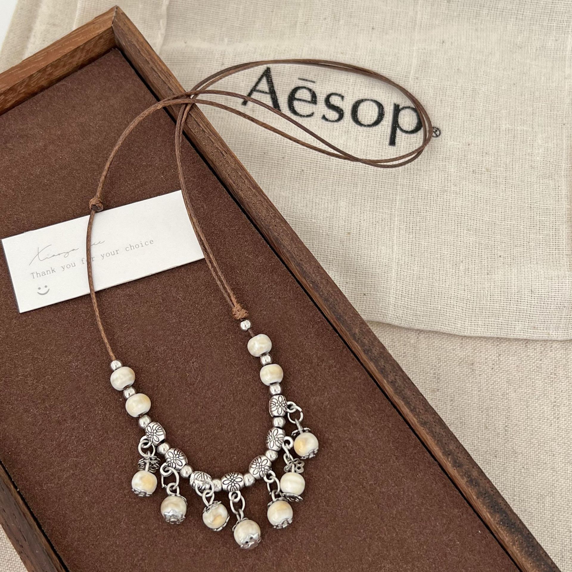 New Chinese-style fresh and light long round bead tassel necklace, retro ethnic style, light luxury, fashionable and elegant sweater chain for women Application Scenario