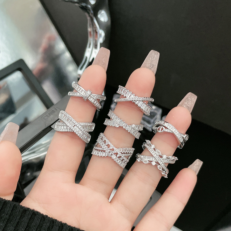 The ring is a niche design for women, featuring a light luxury cross full diamond zircon on Instagram. It's a cool and casual open-mouth ring with a sweet and versatile style full figure