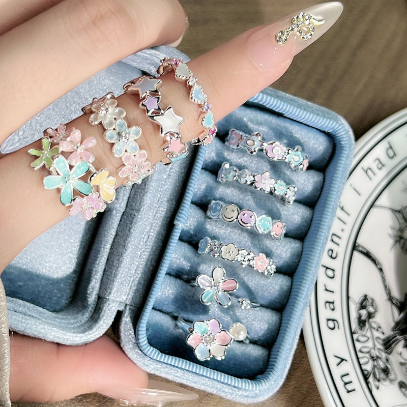 The new summer dopamine colorful enamel flower sweet ring for women's layered wear, a gentle style, light luxury and niche accessory trend full figure