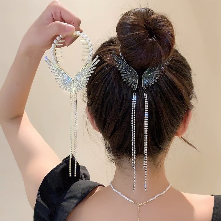 The new ancient wind chime orchid bun hair clip with a high-end look and tassel at the back of the head is a high-end Hanfu hair bun accessory Application Scenario