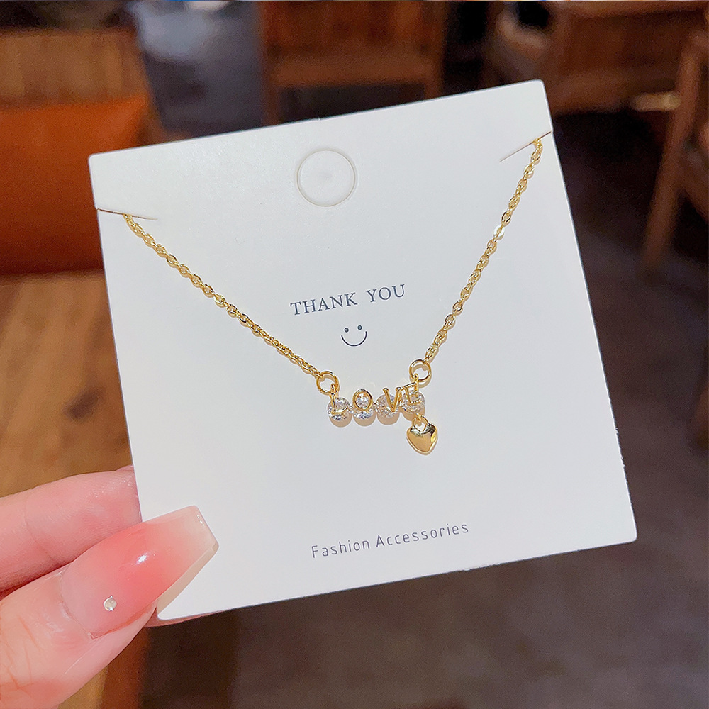 Micro-inlaid zircon heart-shaped pendant, ins-style light luxury titanium steel necklace, women's niche design, Internet celebrity bestseller, collarbone chain trend Specification drawing