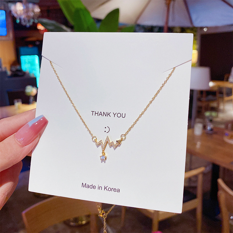 A new Korean-style electrocardiogram micro-inlay pendant necklace that won't fade in summer, an ins fashionable titanium steel collarbone chain full figure
