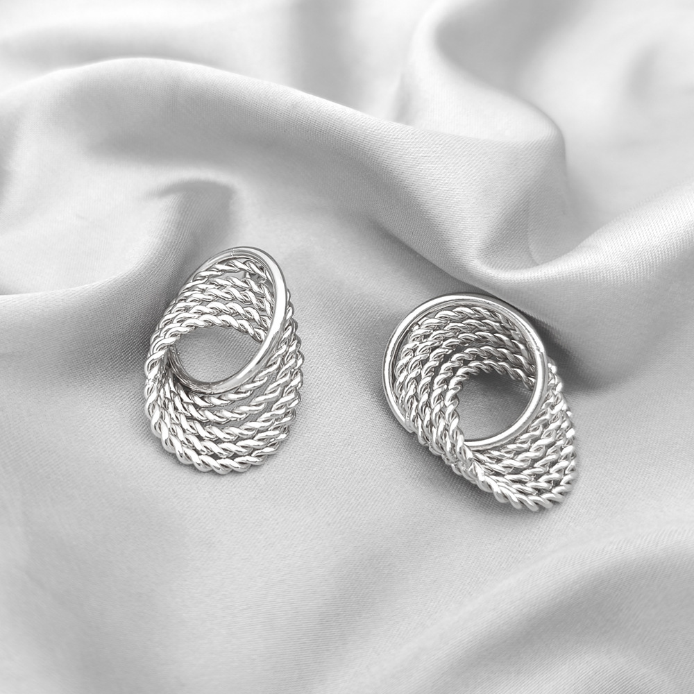 Cross-border geometric twist earrings for women, light luxury, high-end and versatile circle earrings, European and American style design sense ear needles and earrings details Picture