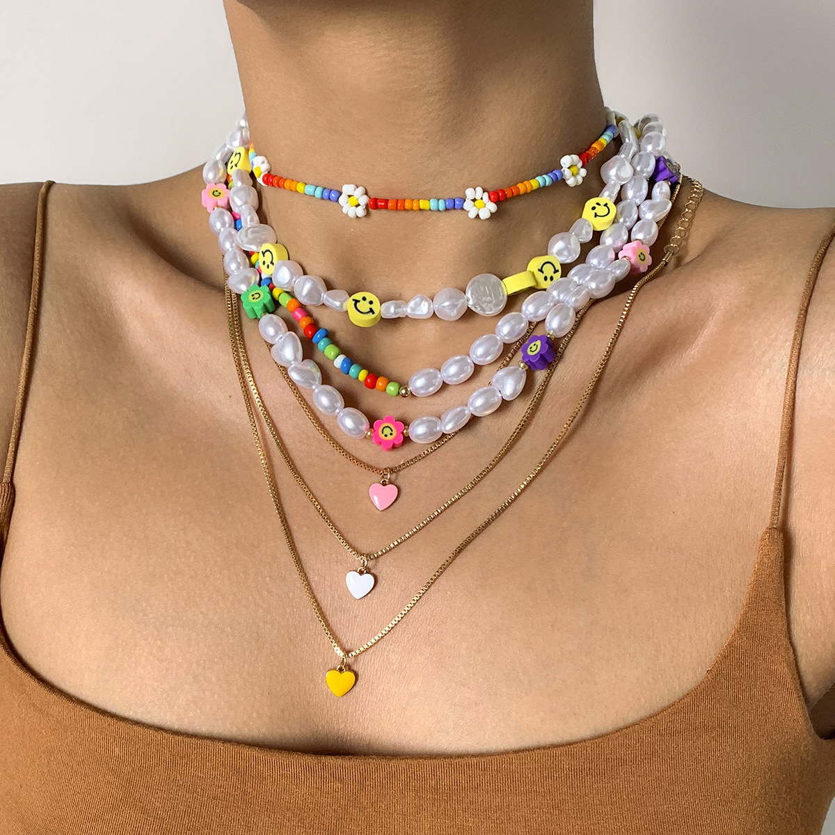 European and American cross-border jewelry: Pastoral rice bead woven Daisy necklace, simple oil-dripping heart-shaped layered collarbone chain full figure